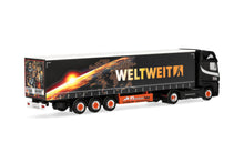 Lade das Bild in den Galerie-Viewer, Mercedes-Benz Actros L 18 Gigaspace Gardinenplanen-Sattelzug "Ferntrans Haas/weltweit" - Herpa 1:87
